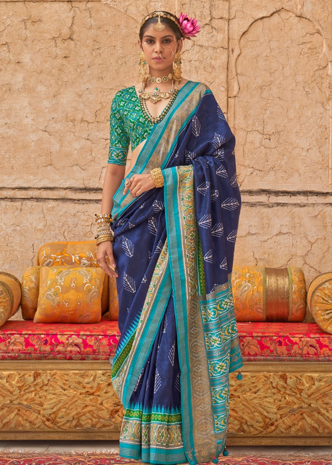 Designer patola silk royal blue bridal saree online shopping for bride in india.