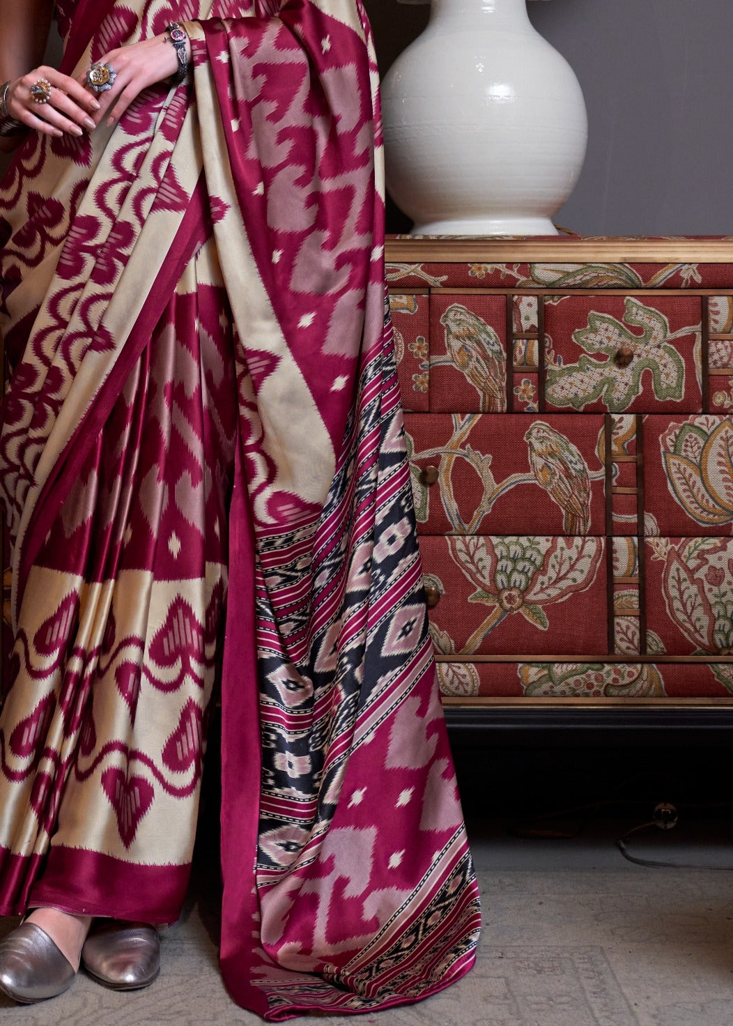 Beautiful satin crepe cream and red saree in usa for online shopping paired with a matching red blouse, designed with bold prints.