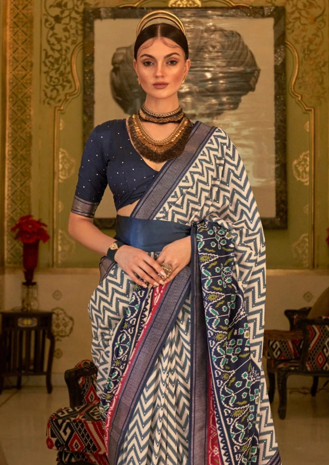 Double ikkat patola silk blue saree blouse online in india for wedding.