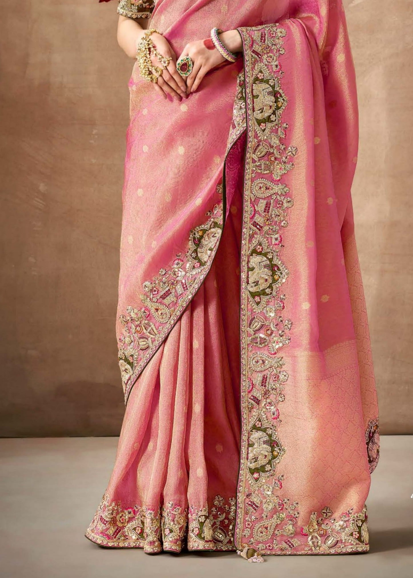 Banarasi tissue silk hand embroidery work pink saree online with contrast mehendi green blouse for bride sangeet.