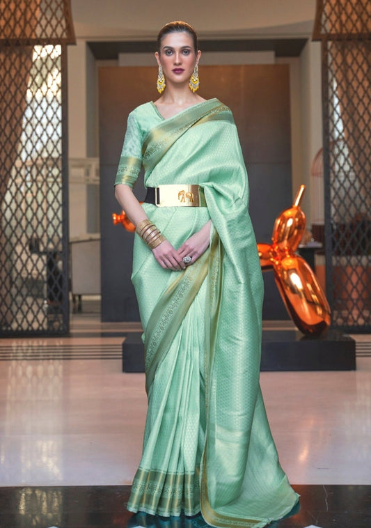 woman in Soft Banarasi Silk Pastel Green Handloom Saree