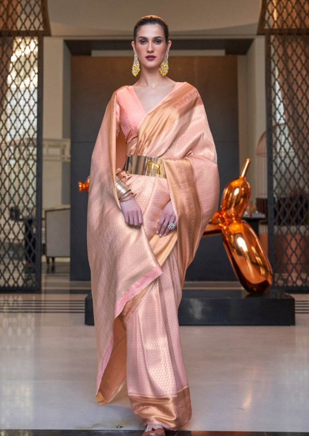 woman in Soft Banarasi Silk Peach Handloom Saree