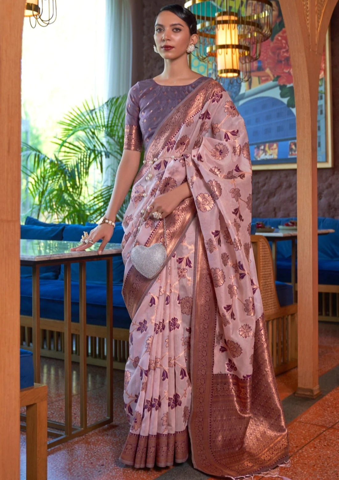 Bride in pure banarasi organza handloom saree in lilac purple color.