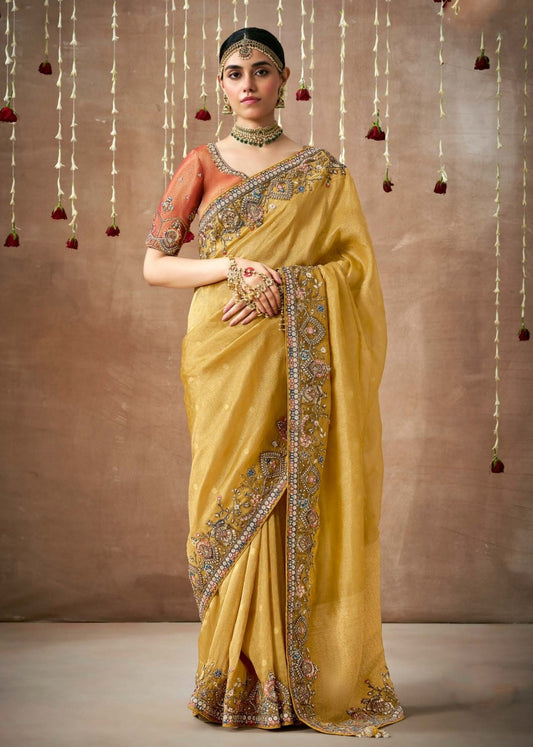 Tissue silk yellow embroidery saree london online shopping with price.