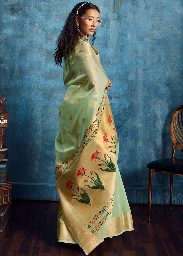 Shop pure banarasi tissue silk mint green handloom aree with delicate lotus motifs & zari work online for weddings & festivals. Lightweight, luxurious & traditional.
