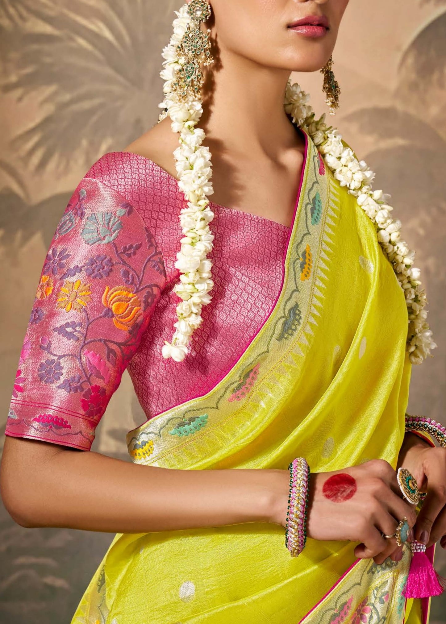 Yellow banarasi silk handloom saree online with contrast pink blouse for wedding wear in traditional design.