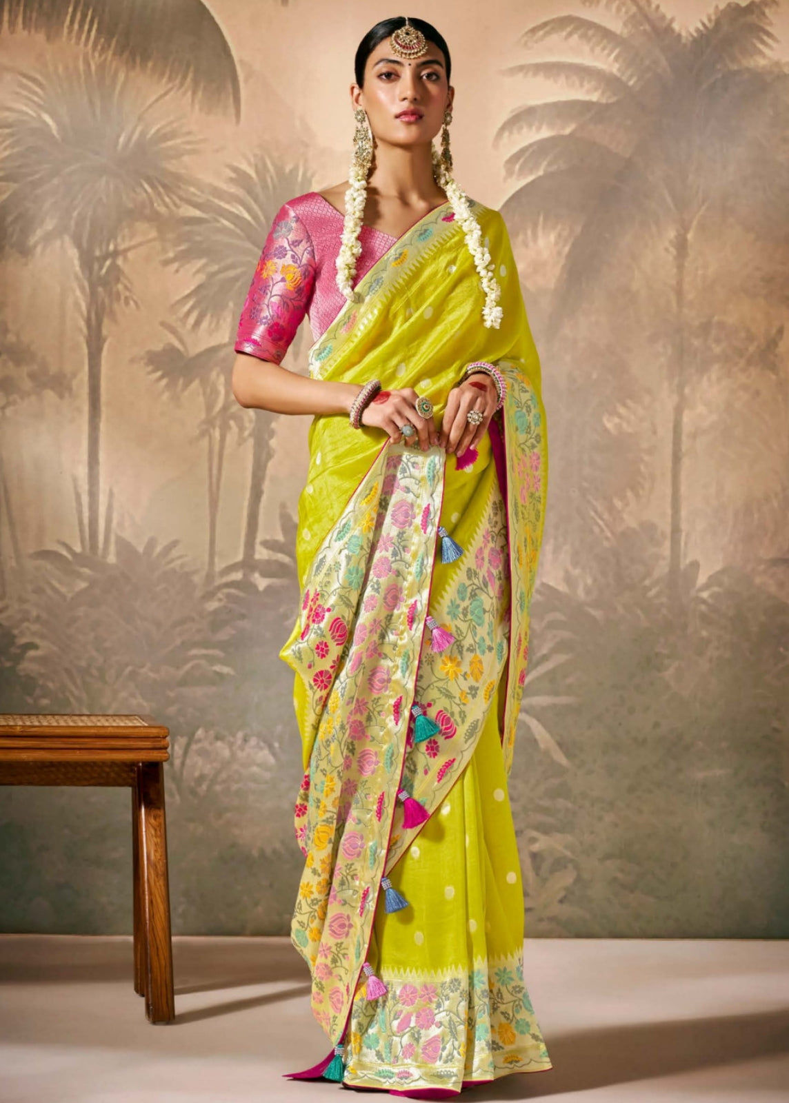 Shop yellow banarasi silk handloom luxury saree online with contrast pink blouse for wedding wear, festive wear or bridal wear.