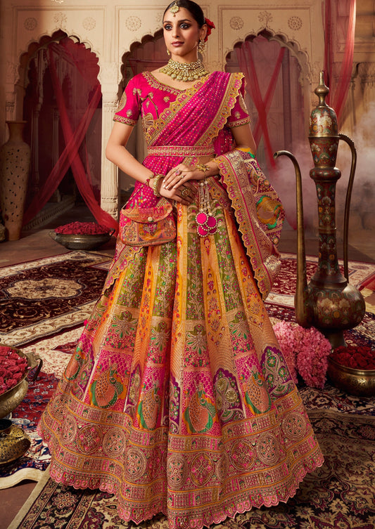 Bride in yellow banarasi silk lehenga with pink choli blouse and dupatta.