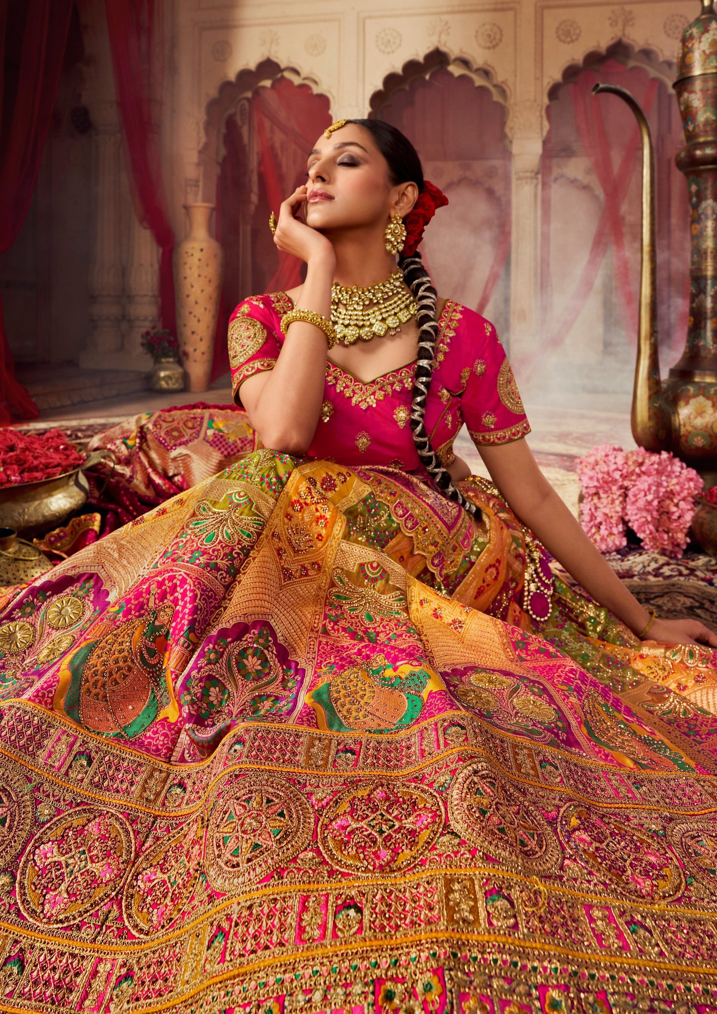 Bride in yellow banarasi silk lehenga with pink choli.