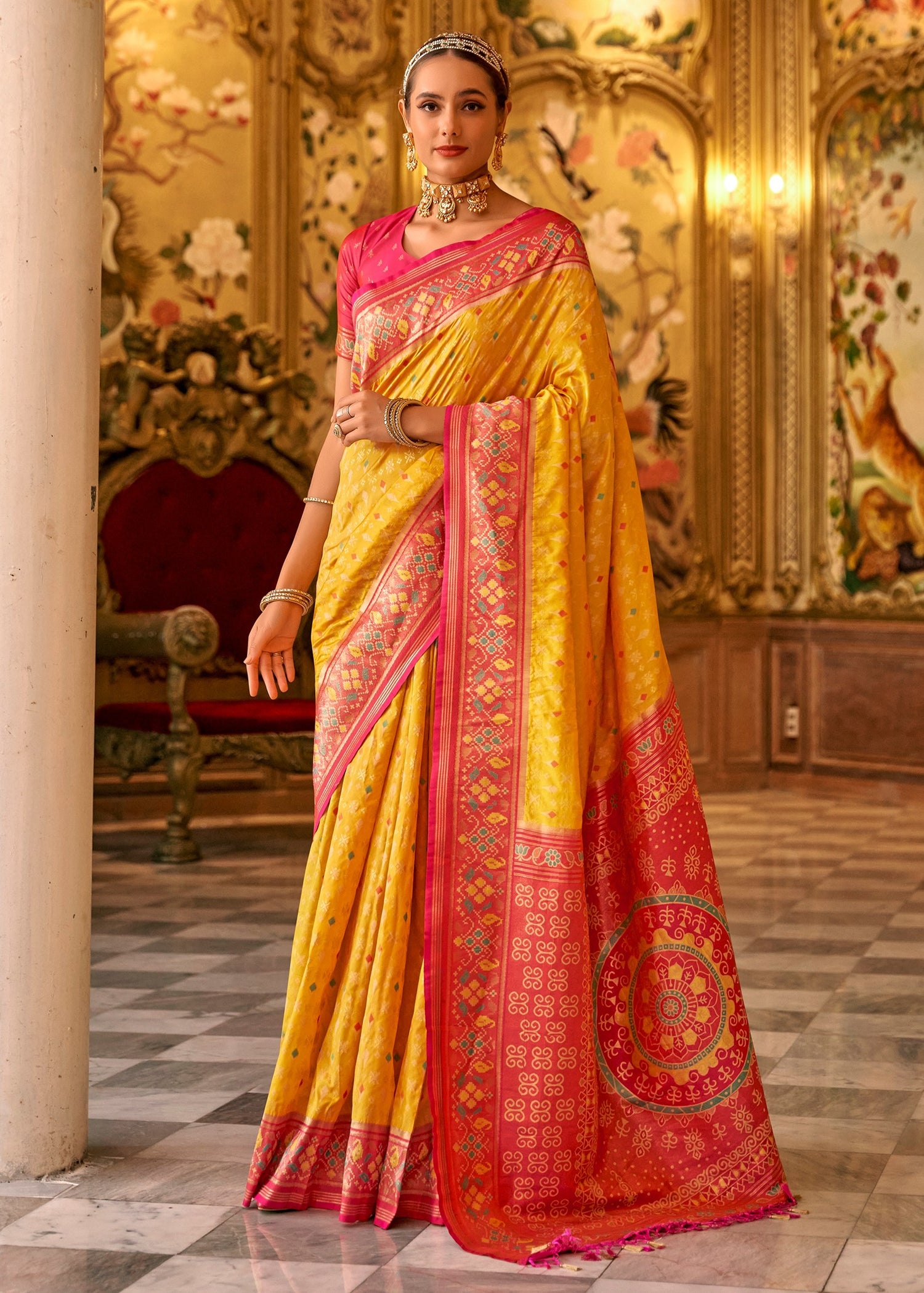 Shop yellow patola silk handloom saree with contrast red blouse online in india usa.