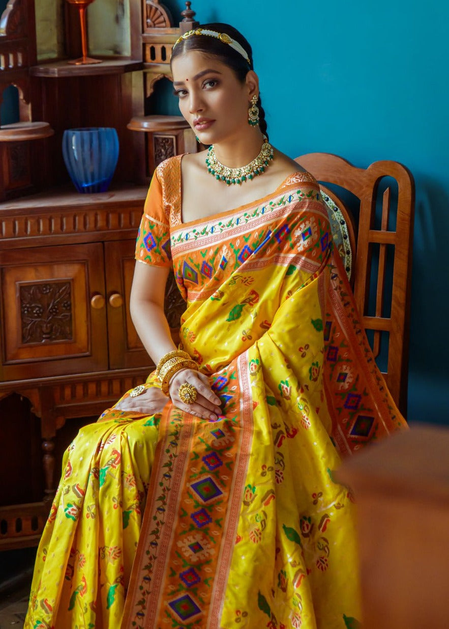 Orange blouse matching with fusion banarasi patola silk yellow saree, creating a vibrant contrast for bridal wear at best price.