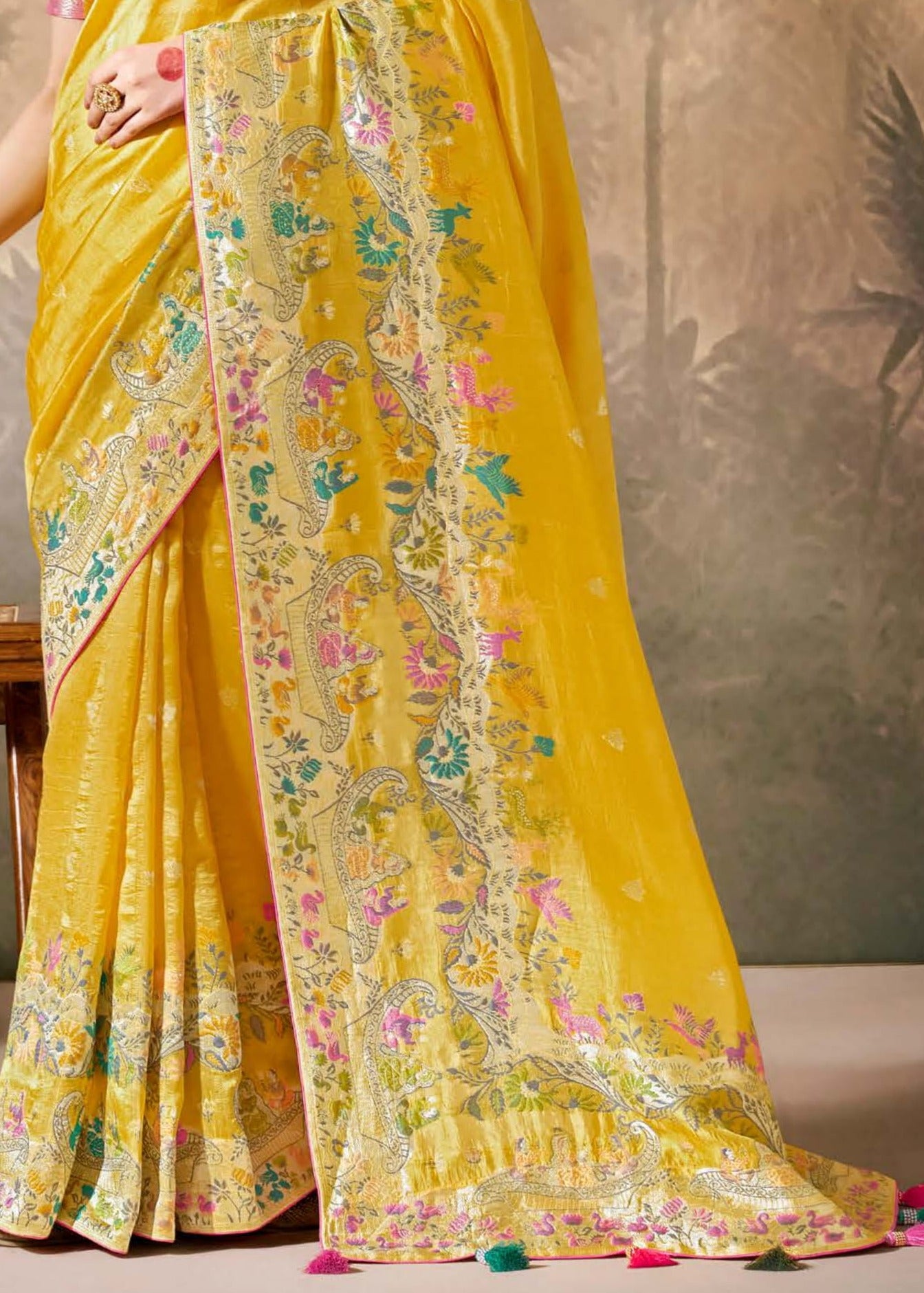 Yellow colour pure banarasi silk saree with pink blouse online for haldi.