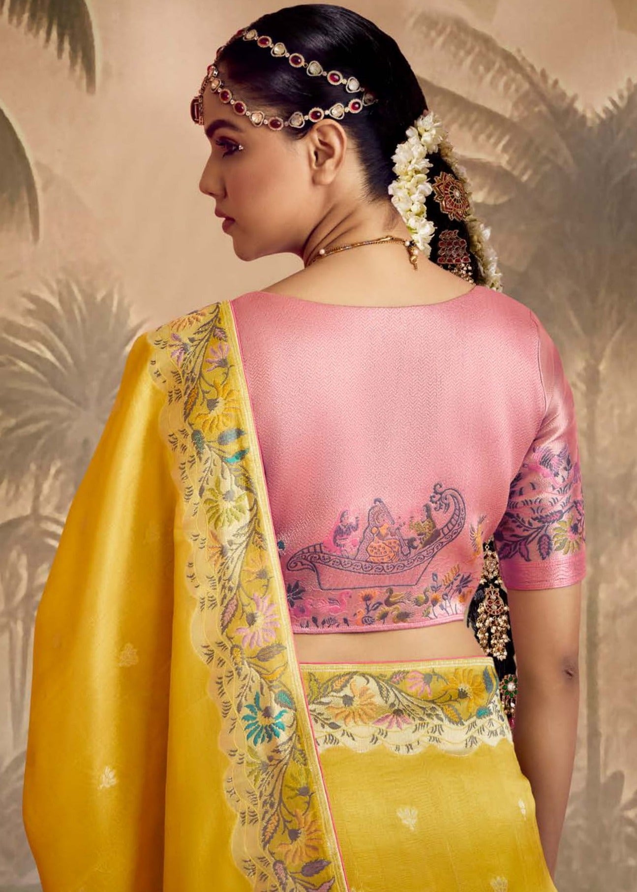 Shop yellow banarasi silk saree with pink blouse look online for haldi.