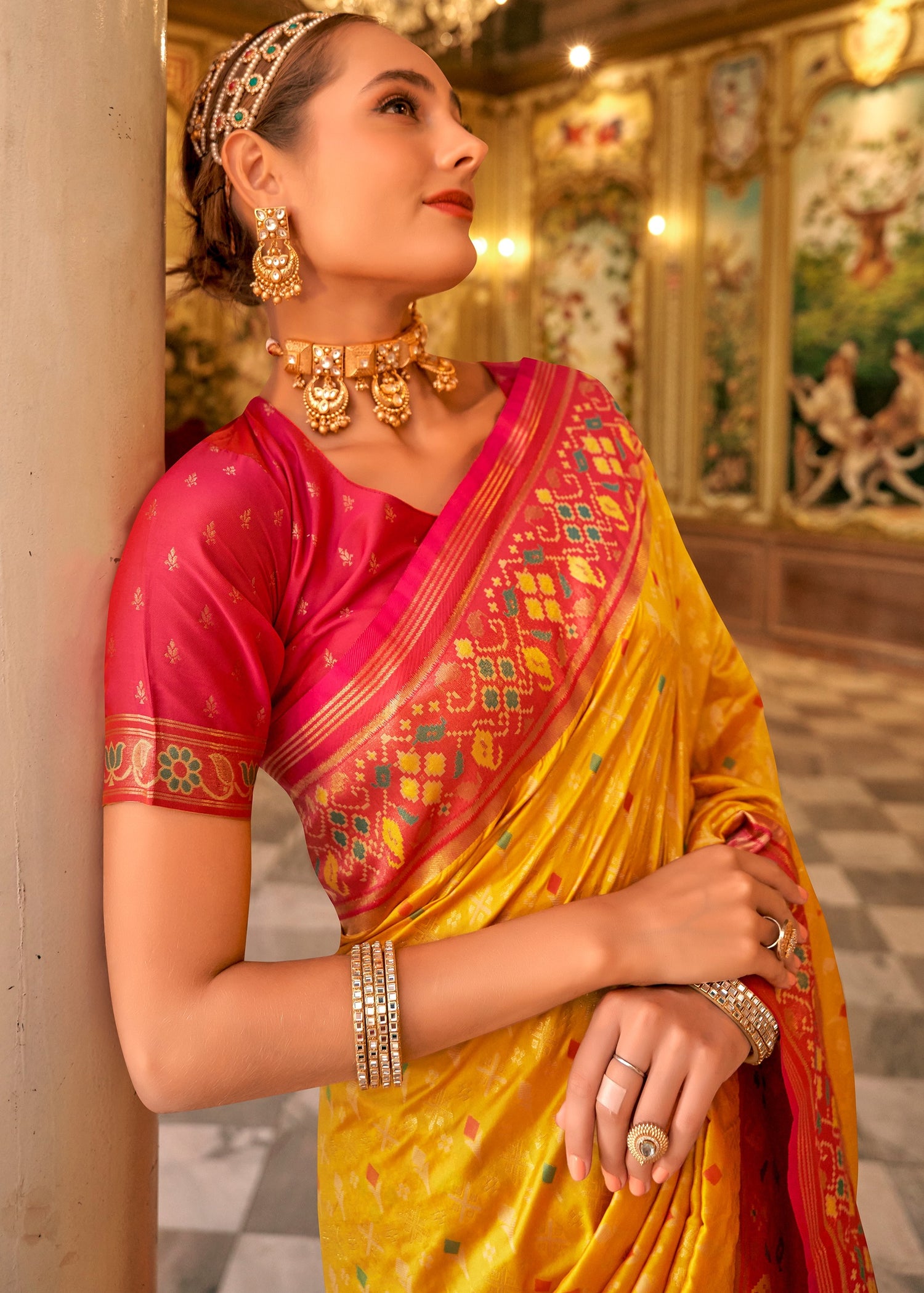 Yellow patola silk handloom saree with contrast red blouse online usa for indian bride and bridesmaids.