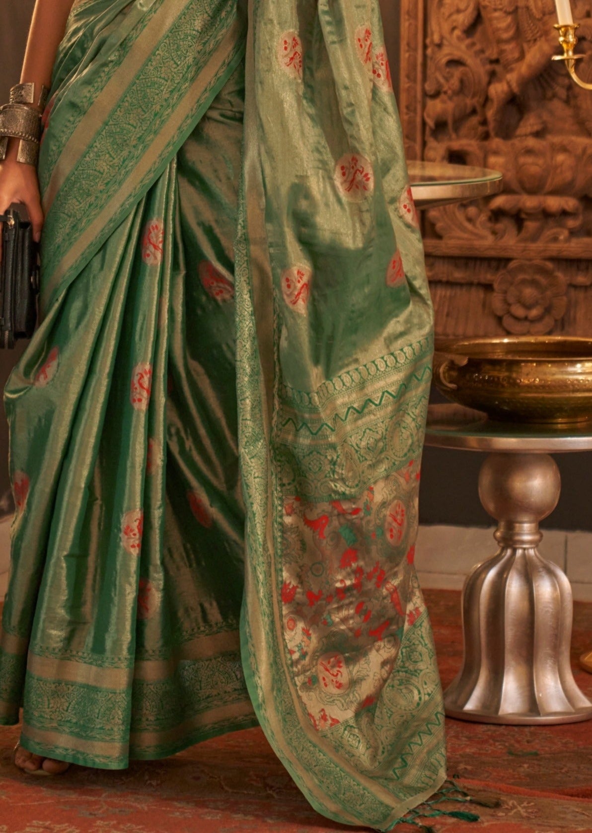 Pure handloom banarasi silk saree design in green color.