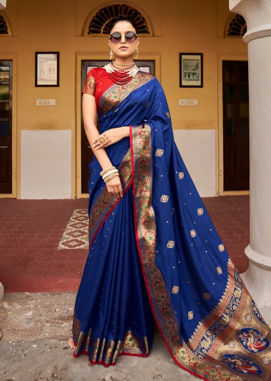 Blue silk weaving saree online with contrast red blouse.