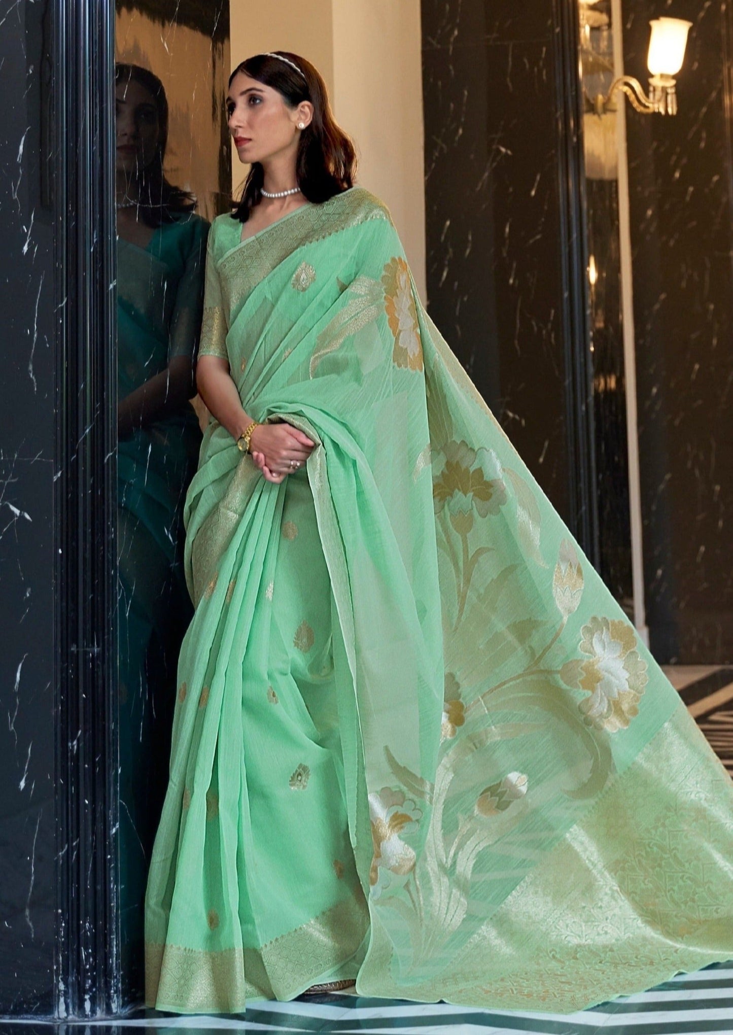 Pure linen saree online with golden zari border.