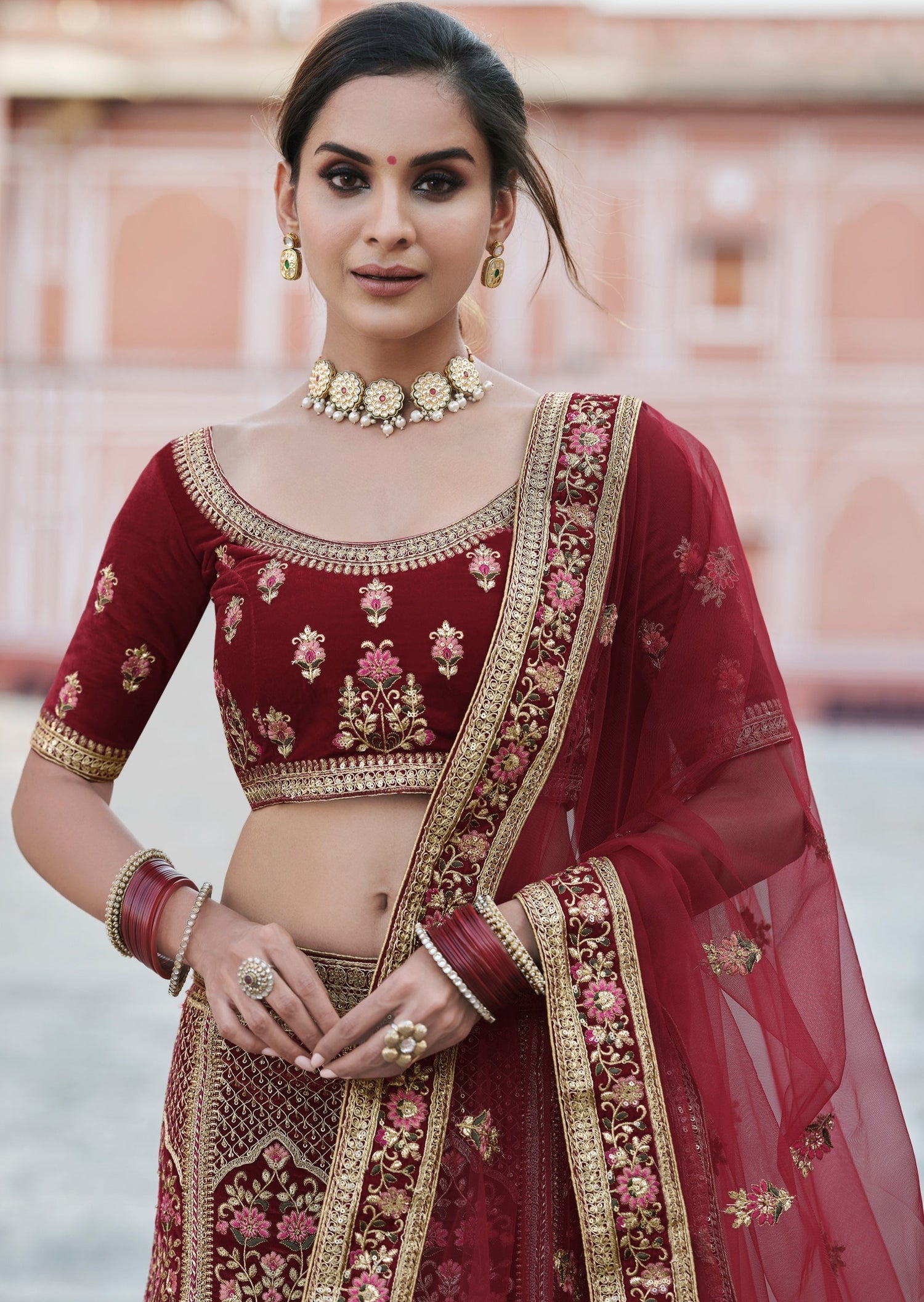 MAROON LEHENGA SET WITH ALL OVER 'BAADLA' SILVER EMBROIDERY PAIRED WITH A  MATCHING DUPATTA AND ALL OVER SILVER EMBELLISHMENTS. - Seasons India