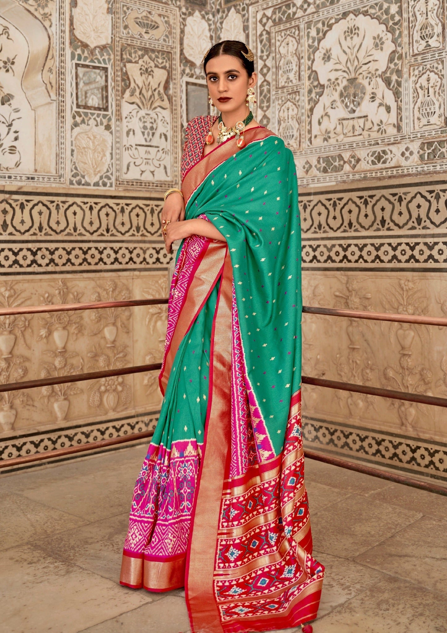 Patola saree online in green & red color.