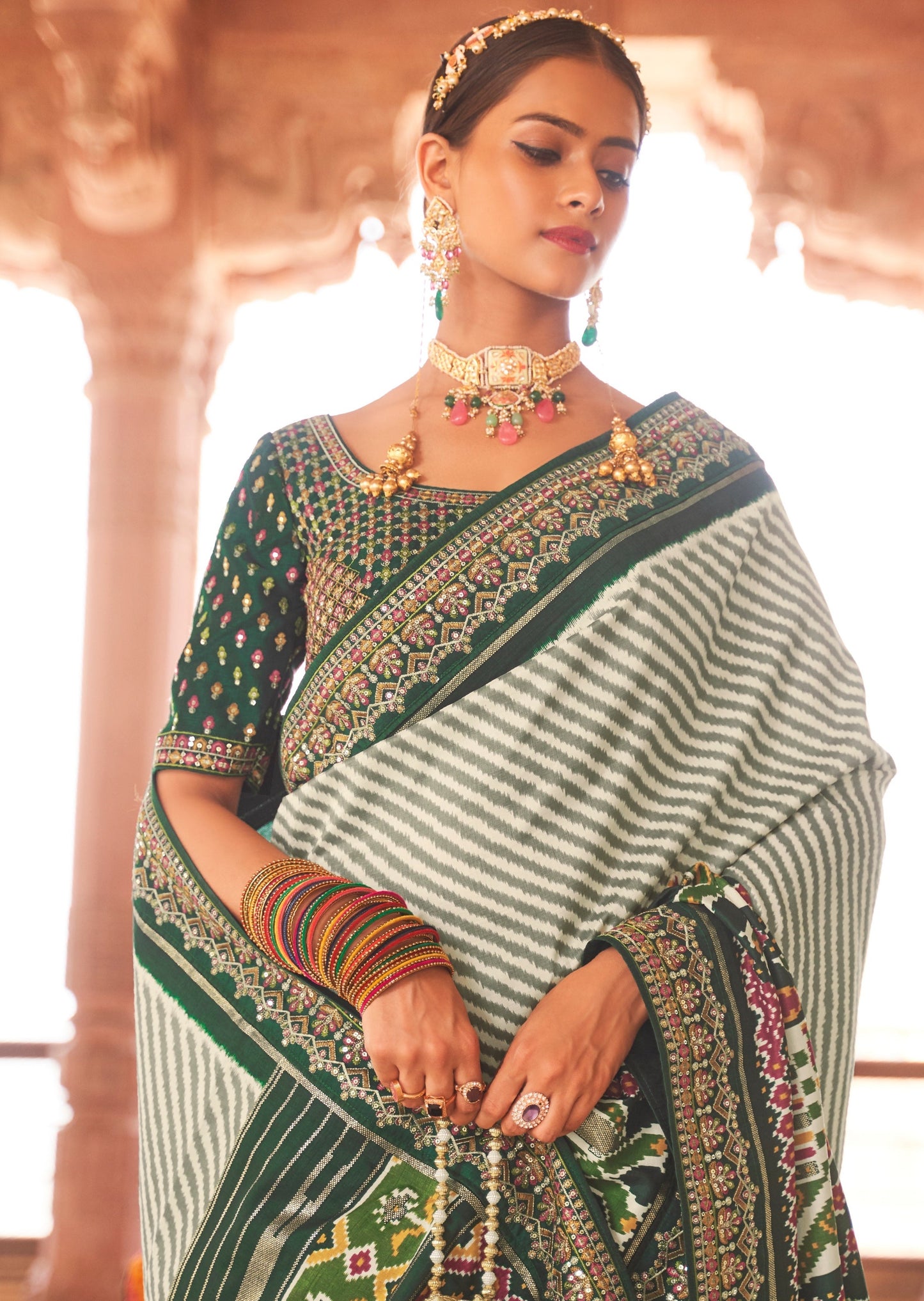 White and Dark Green Sequins Patola Saree