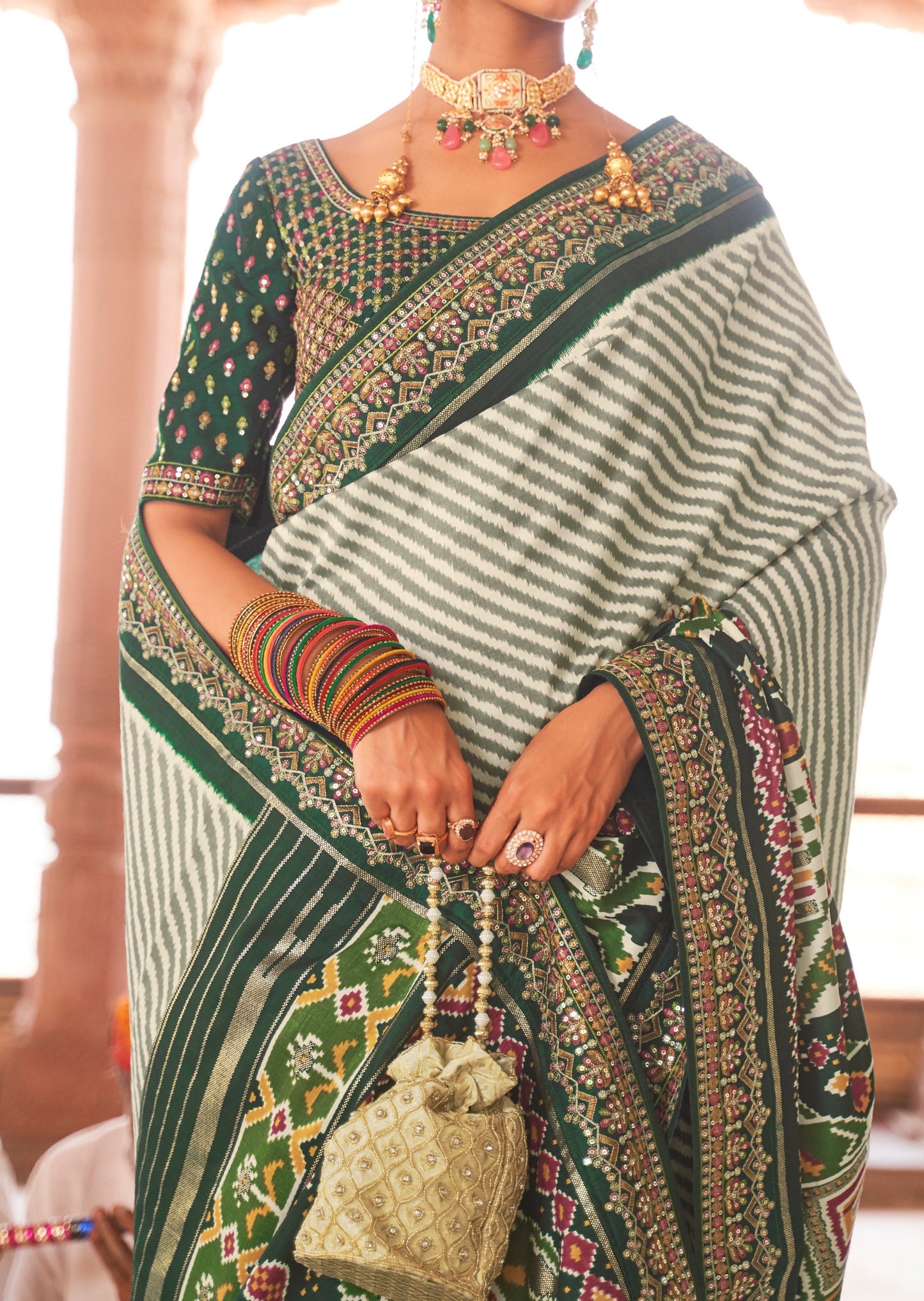 White and Dark Green Sequins Patola Saree