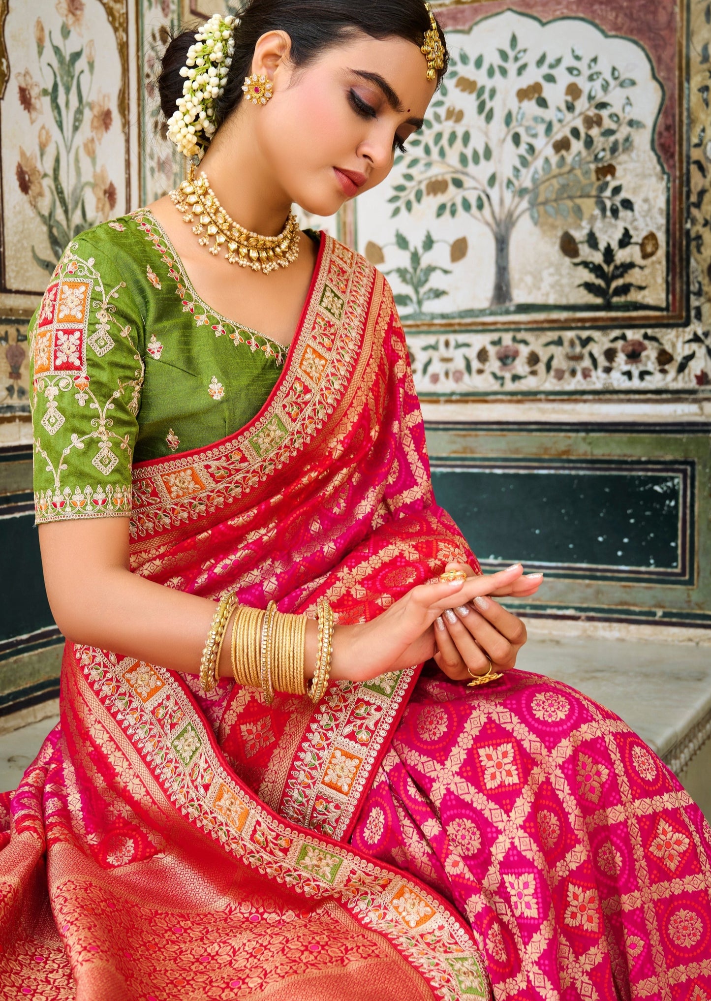 Banarasi Patola Silk Pink Saree with Contrast Green Blouse