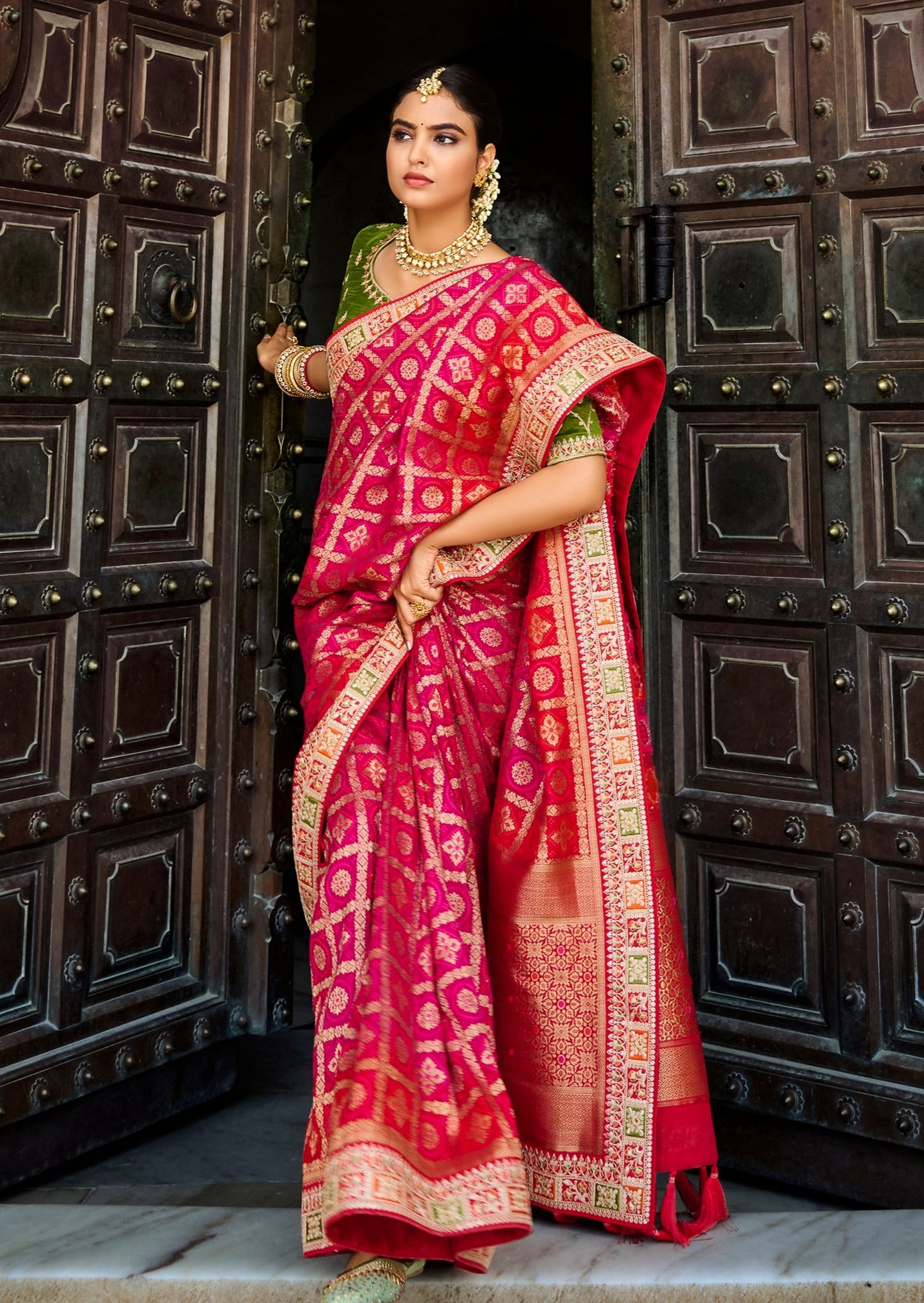 Banarasi Patola Silk Pink Saree with Contrast Green Blouse