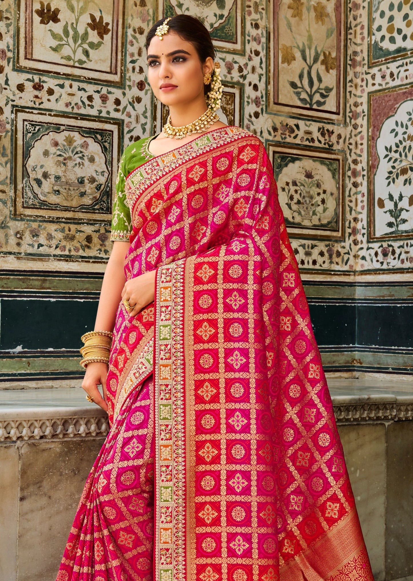 Banarasi Patola Silk Pink Saree with Contrast Green Blouse