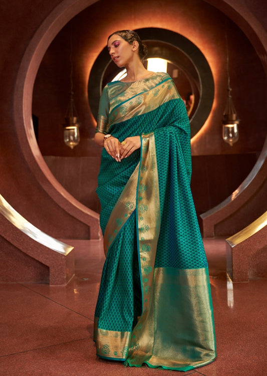woman standing in blue color Pure Kanjivaram Silk Handloom Saree