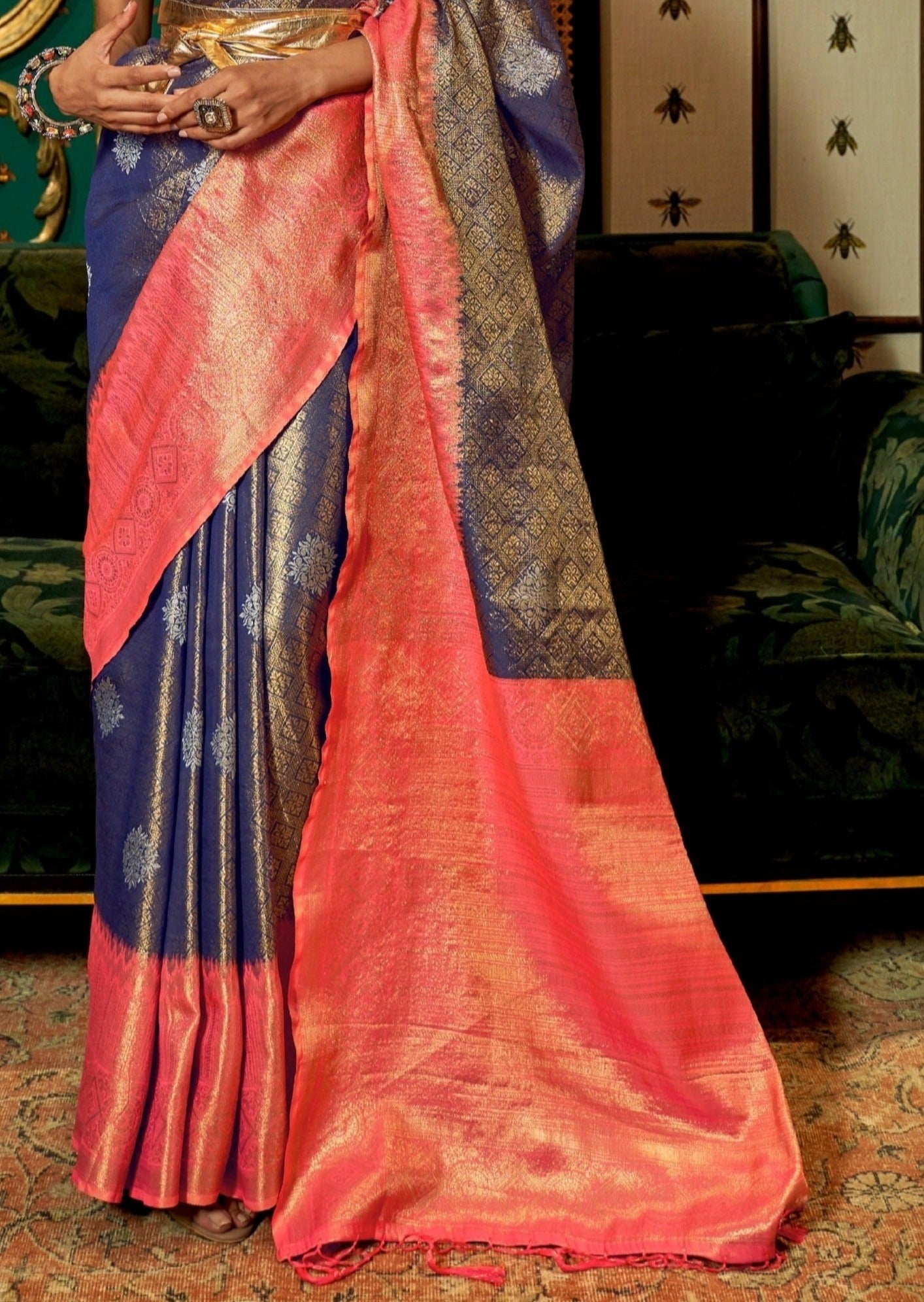 Banarasi saree pallu design online in blue and orange color combination with heavy zari work.