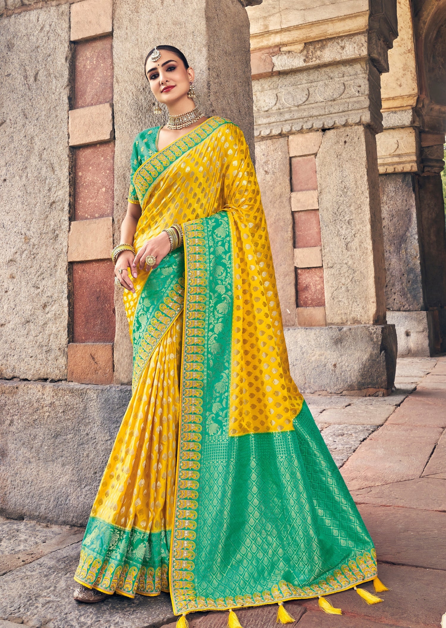 Pure silk banarasi saree in yellow - green bridal design with embroidered pallu featuring handloom weaving and traditional zari work for indian wedding.