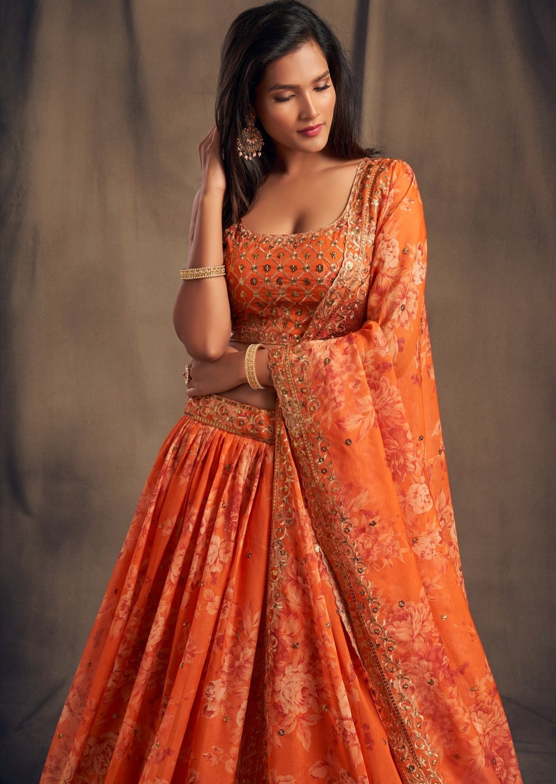 Shop orange bridesmaids lehenga choli in usa online for indian wedding look at best price.