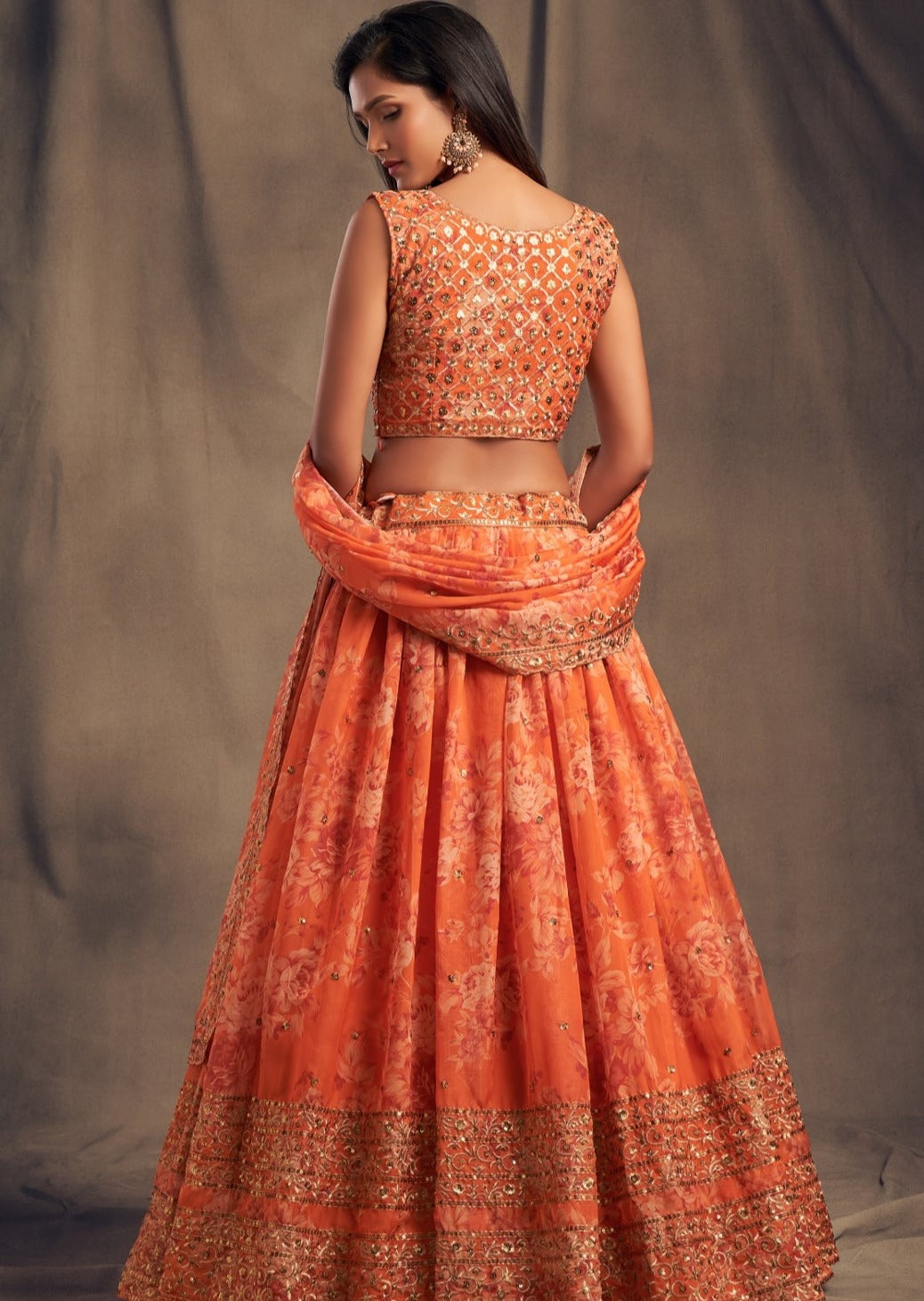 Organza lehenga uk london in orange color for indian bridesmaids.