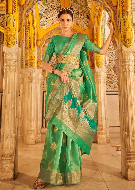 Tissue silk saree with golden border in green colour online.