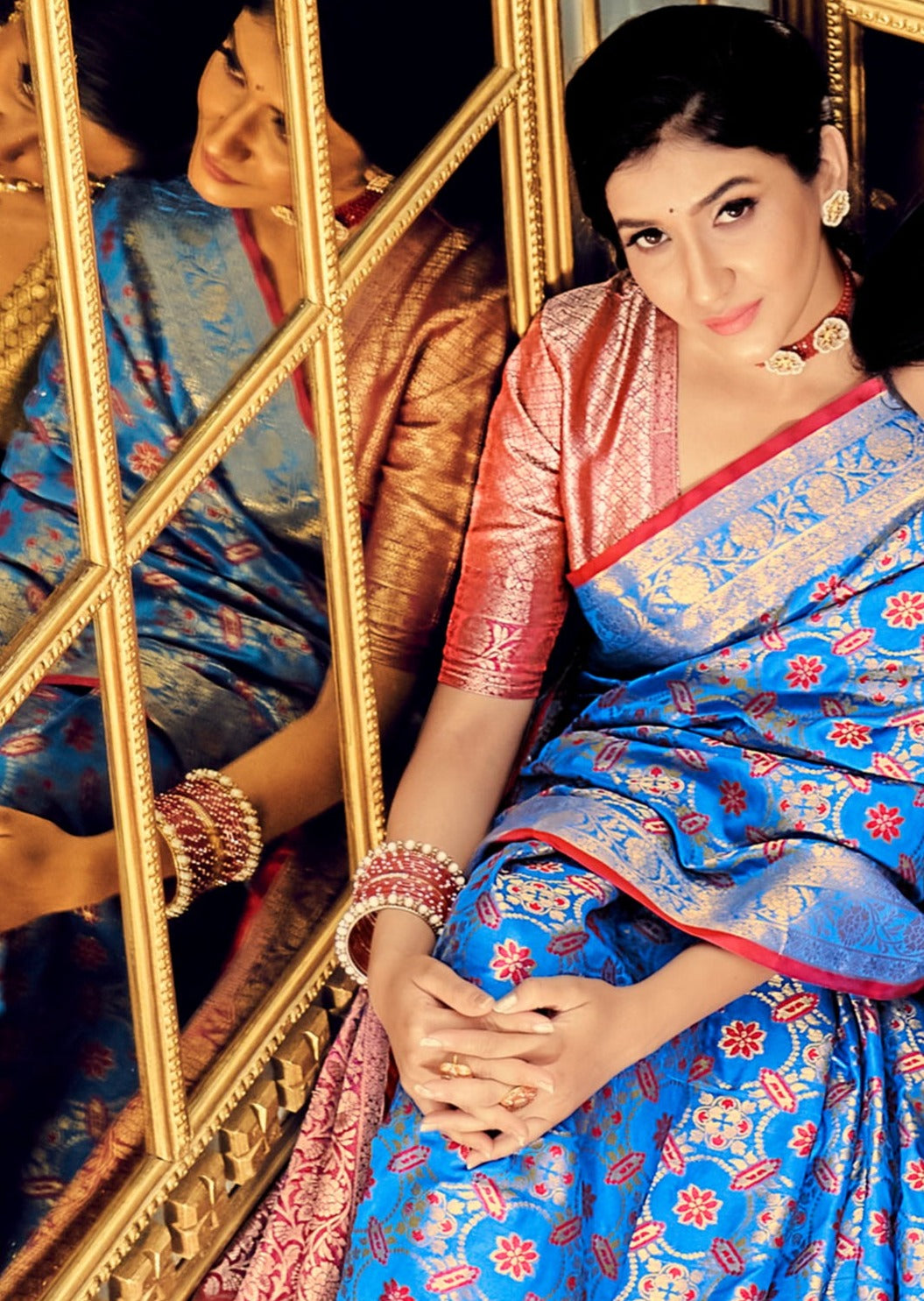 Handloom banarasi patola silk blue bridal saree online in traditional designs for wedding.