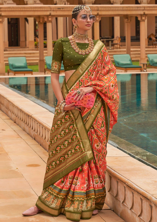 Orange patola ikkat saree with green blouse online shopping price.