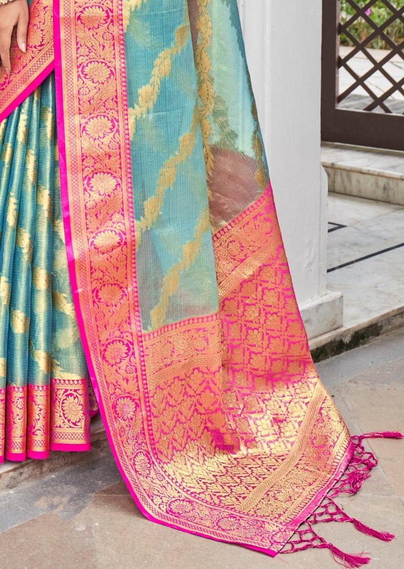 Pastel blue banarasi tissue silk handloom saree online design with gold zari weaving border in contrast pink colour base.