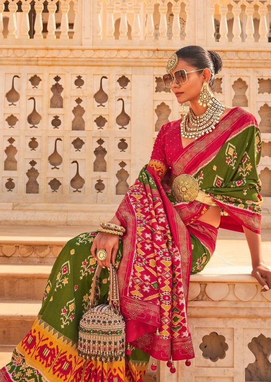 Patan patola green multicolor ikat saree online with multicolor weaving.