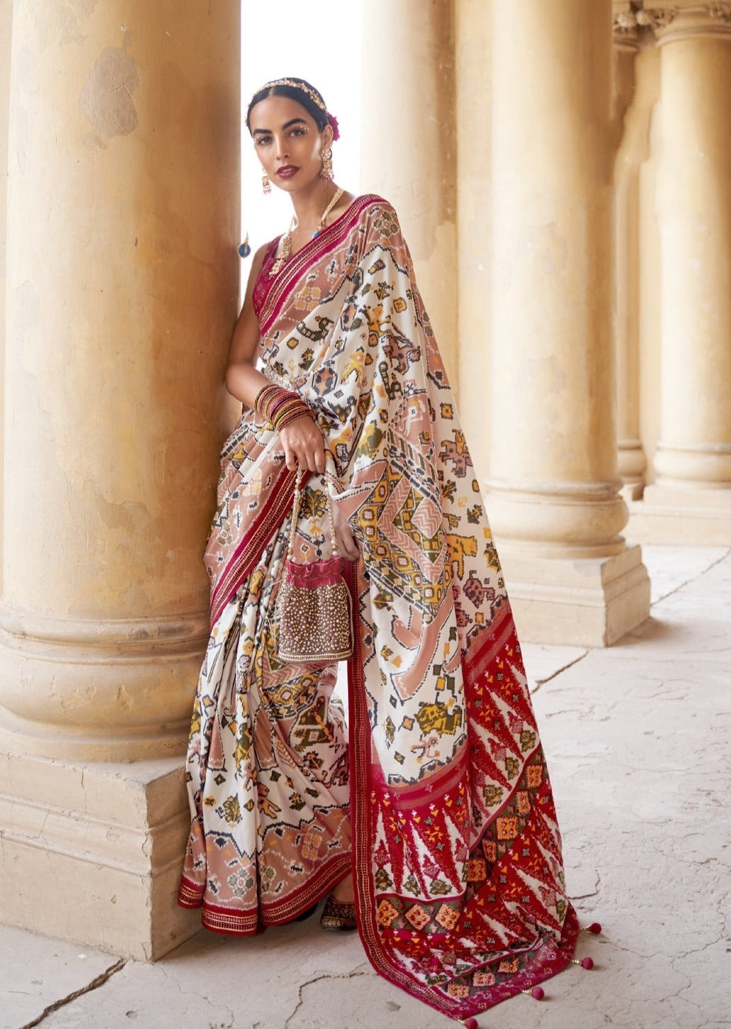 Patan patola silk saree online usa in white and red color combination at fast delivery to usa.