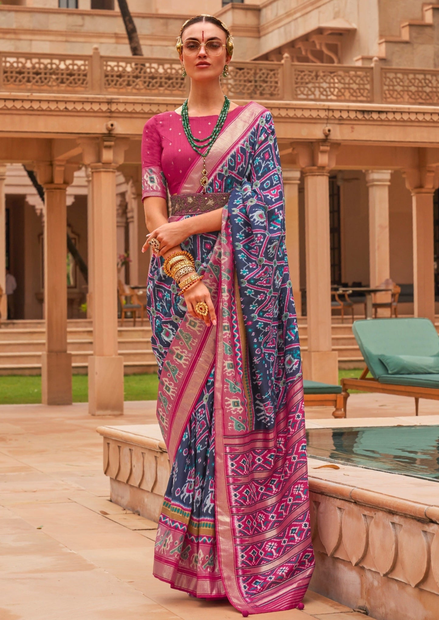 Woman's patola silk indigo blue saree with pink blouse online shopping price india.