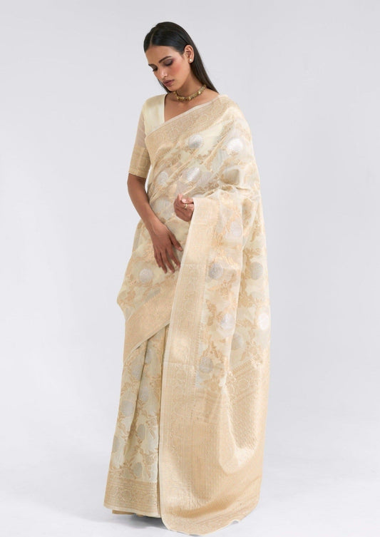 Pure linen silk handloom saree online in cream beige colour featuring zari weaving available in india at best price.
