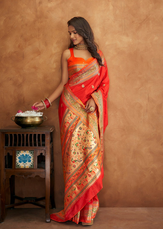 Handloom paithani sarees online in red colour with gold zari border.