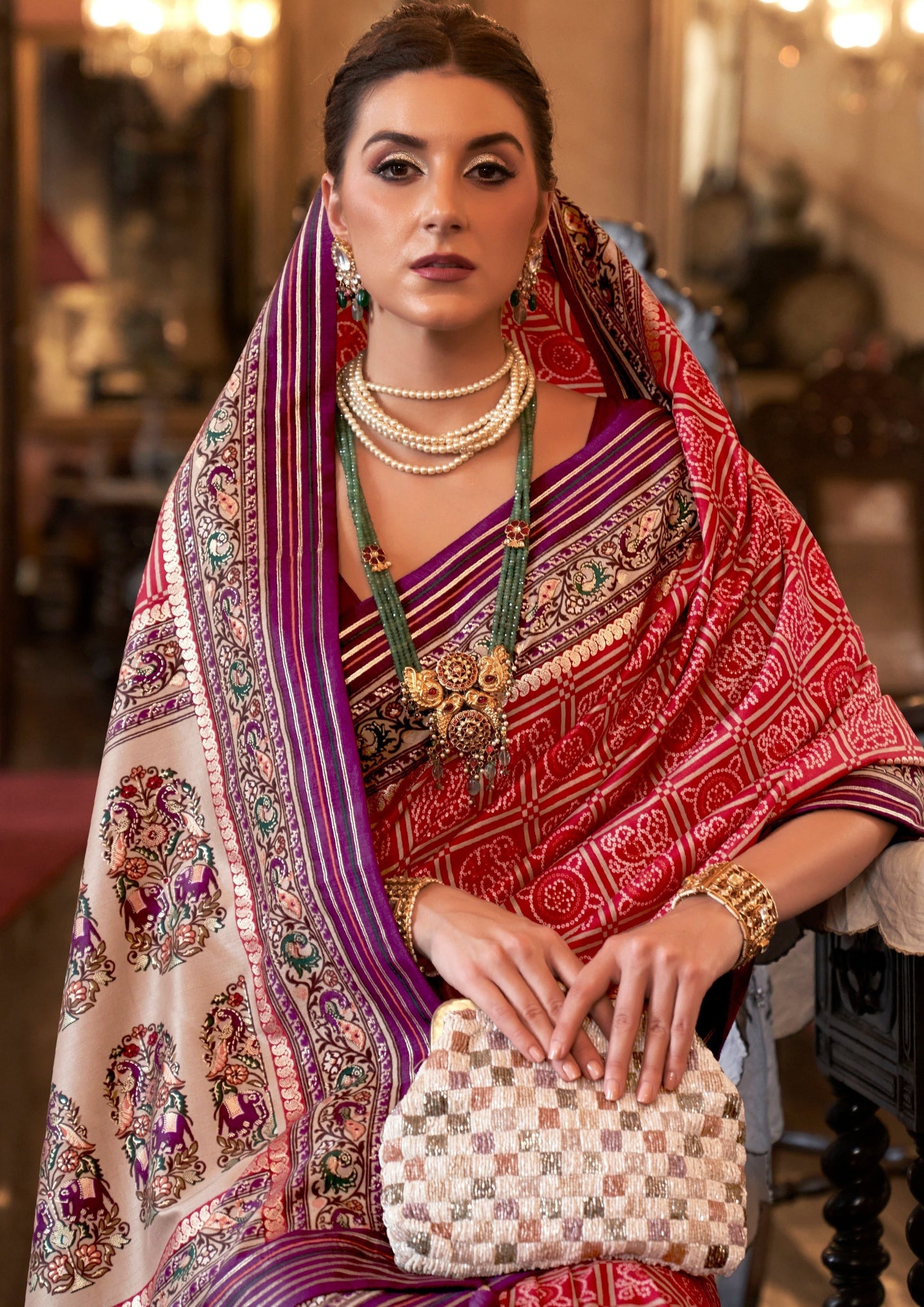 Bride in red bandhani saree online india.