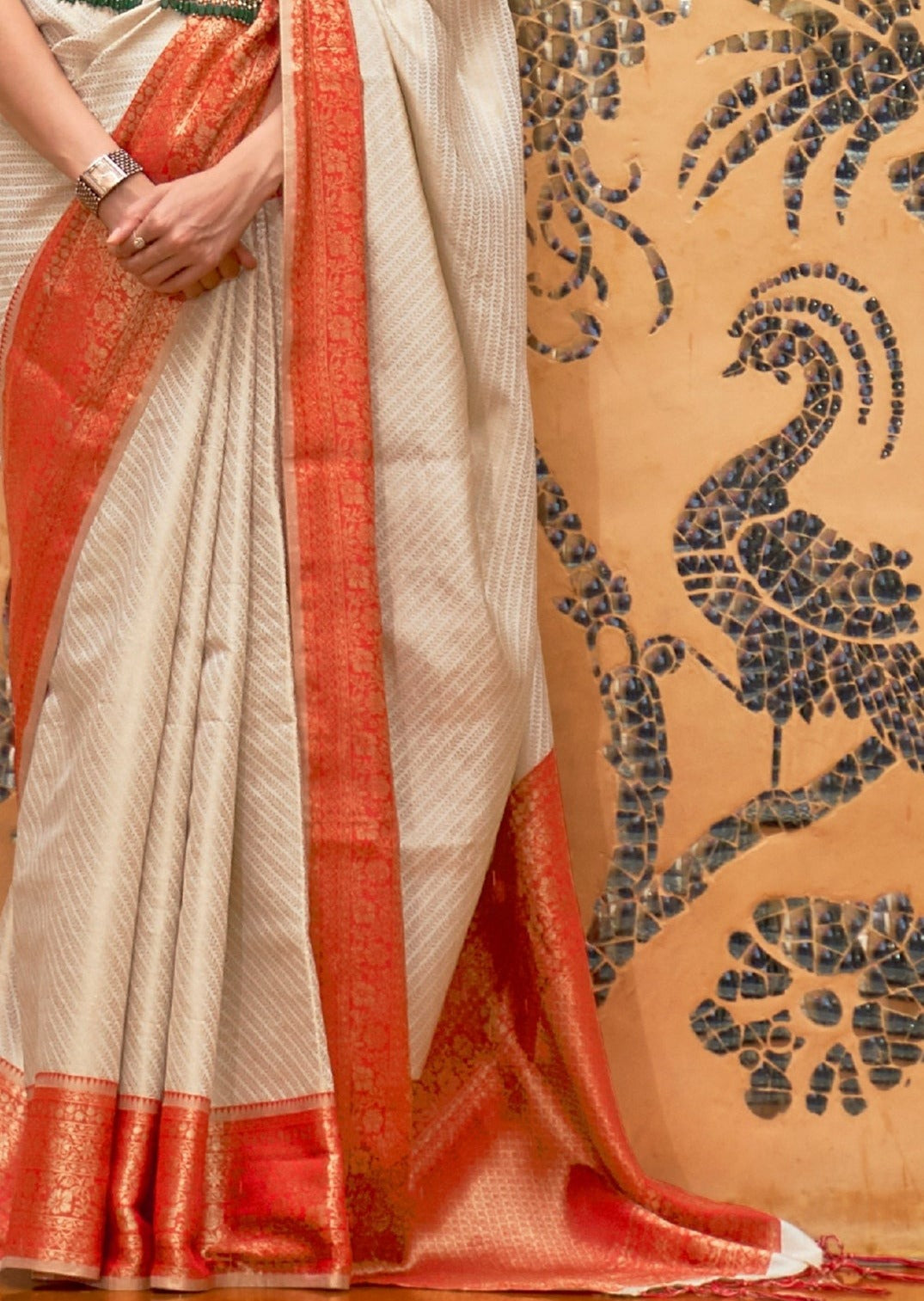 Shop red and cream handloom silk kanjivaram saree for bridal wear on sale.