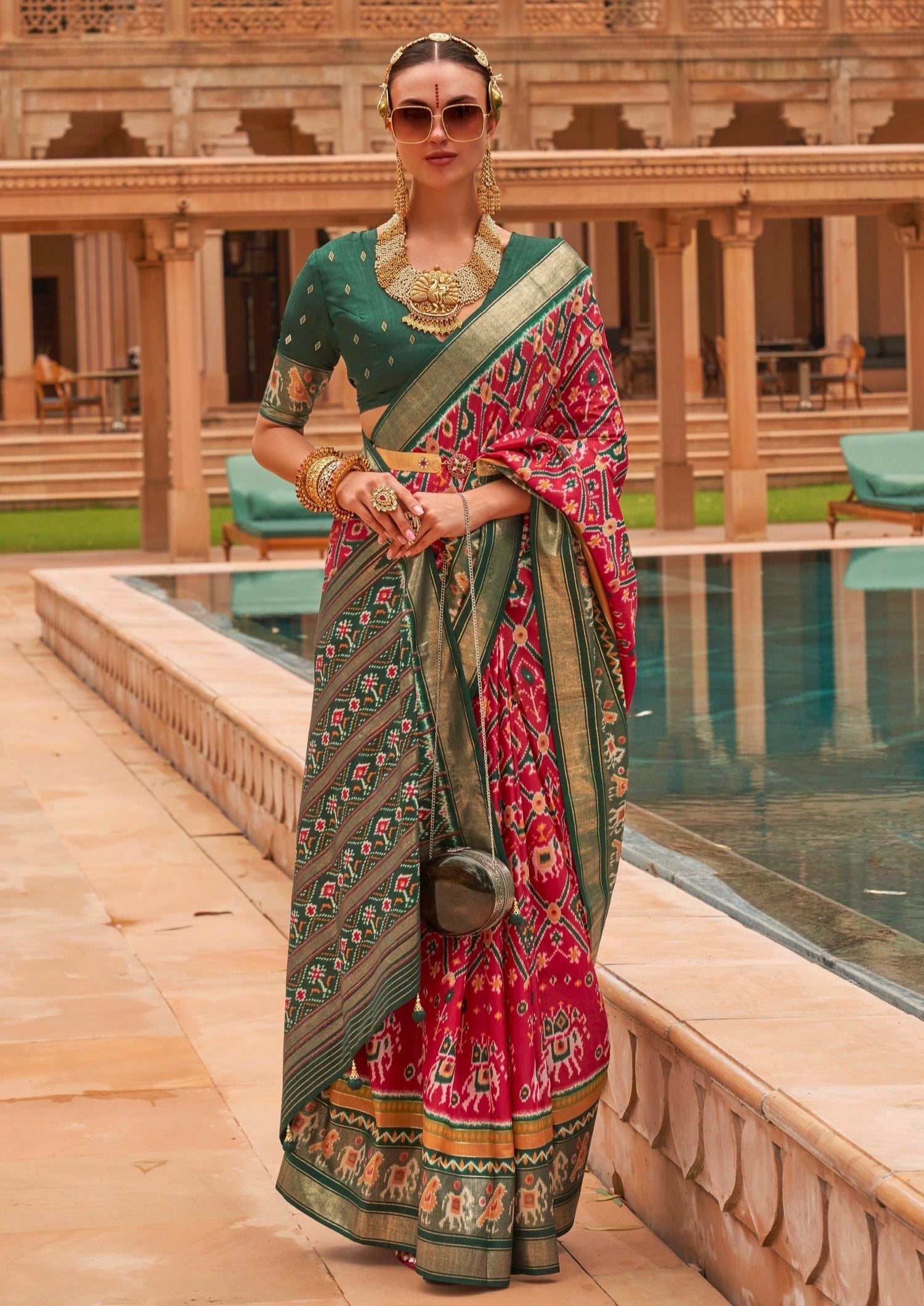 Red double ikkat patola silk saree online shopping for wedding.