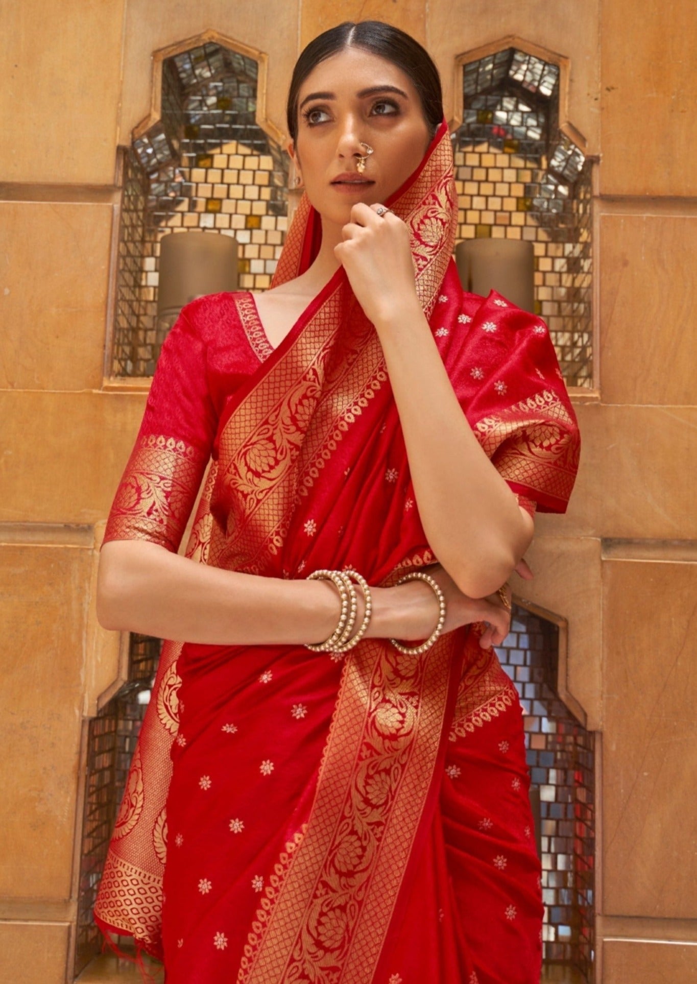 Red kanjivaram silk saree with golden zari border online for wedding & bridal look.