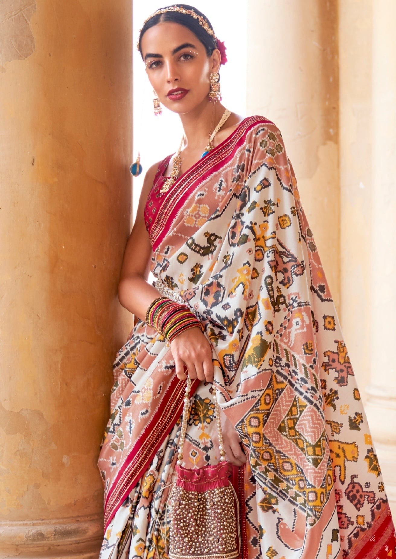 Patola saree online usa fast delivery in white and red color.