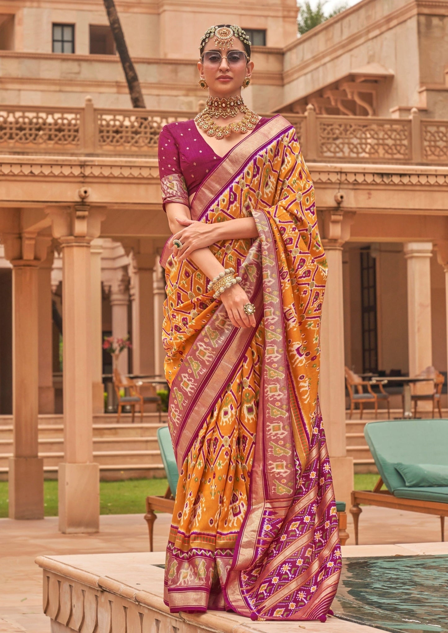 Woman's yellow double Ikat patola saree online shopping.