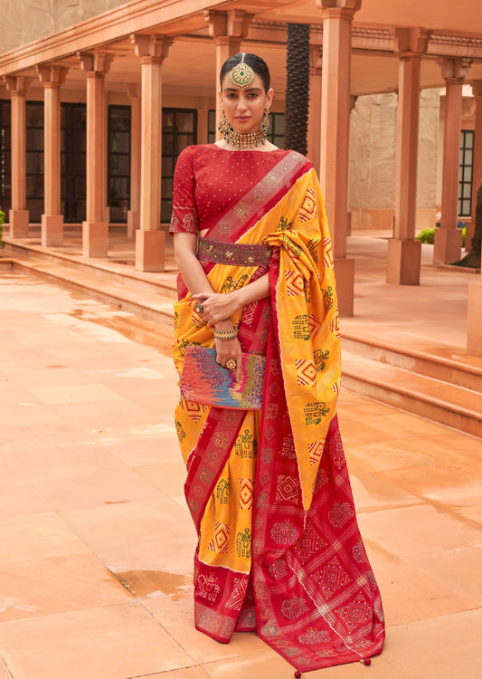 Patola saree original design in yellow red colour combination available for online shopping.